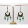 BOUCLES D'OREILLES AVEC ESTAMPES COULEUR BRONZE ET PERLES DE VERRE