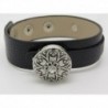 BRACELET MANCHETTE CUIR NOIR AVEC MOTIF CENTRAL