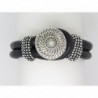 BRACELET MANCHETTE  EN CUIR NOIR AVEC PERLES ET MOTIF CENTRAL METAL