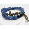 BRACELET WRAP DEUX TOURS PERLES DE VERRE DE COULEUR BLEU ET OBSIDIENNE ET COULEUR LAITON